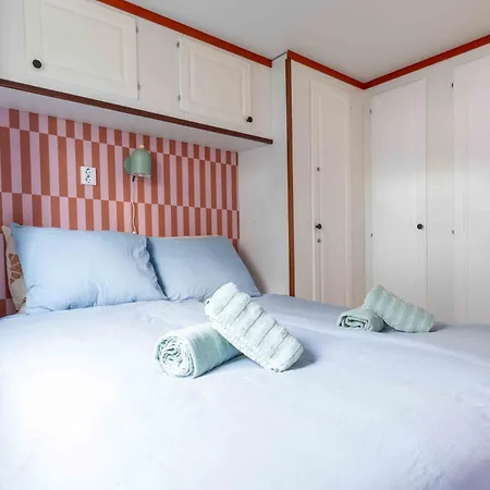 Nyaraló Kleurrijk Boshuisje Sole Op De Veluwe *