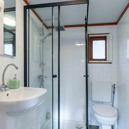 Nyaraló Kleurrijk Boshuisje Sole Op De Veluwe *